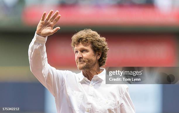 Former Milwaukee Brewer and Hall of famer Robin Yount waves to the crowd before the start of the Washington Nationals game at Miller Park on August...