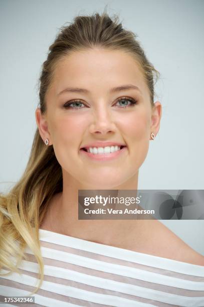 Amber Heard at the "Paranoia" Press Conference at the Four Seasons Hotel on August 1, 2013 in Beverly Hills, California.