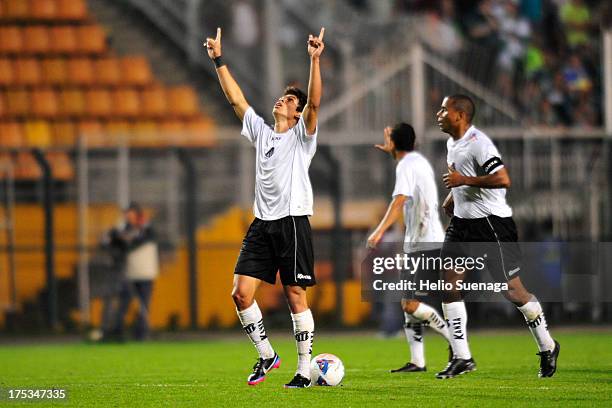 Dudu of Bragantino celebrates a scored goal during the match between Palmeiras and Bragantino for the Brazilian Championship Serie B 2013 at Pacaembu...