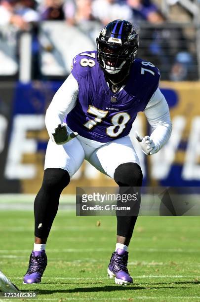 Morgan Moses of the Baltimore Ravens blocks against the Detroit Lions at M&T Bank Stadium on October 22, 2023 in Baltimore, Maryland.