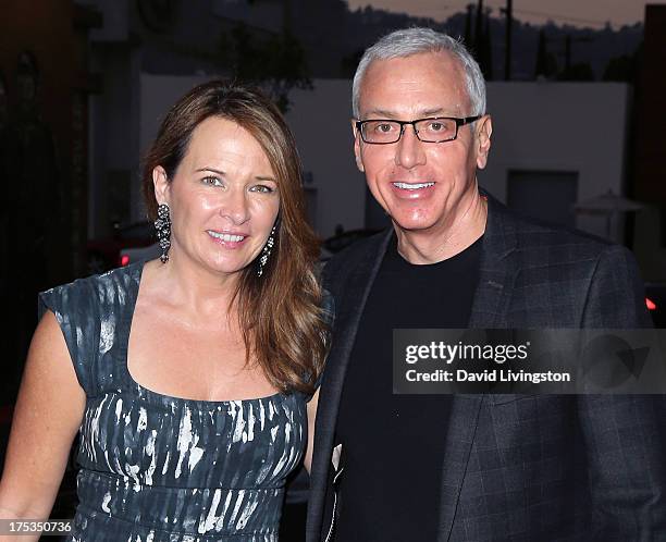 Personality Dr. Drew Pinsky and wife Susan Pinsky attend the launch of Loni Love's new book "Love Him or Leave Him" at Hollywood Improv on August 2,...