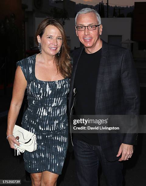 Personality Dr. Drew Pinsky and wife Susan Pinsky attend the launch of Loni Love's new book "Love Him or Leave Him" at Hollywood Improv on August 2,...