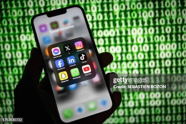 This illustration photograph taken on October 30 shows the the main social network applications on a smartphone in Mulhouse, eastern France.