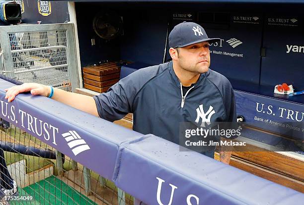 Joba Chamberlain of the New York Yankees looks on against the Tampa Bay Rays at Yankee Stadium on July 28, 2013 in the Bronx borough of New York...