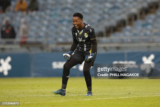 South Africa's goalkeeper Andile Dlamini celebrates a goal during the 2024 Olympic Qualifier second leg match between South Africa and Democratic...