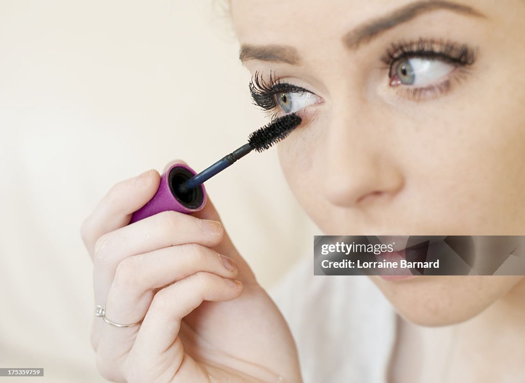 Young Woman Applying Mascara