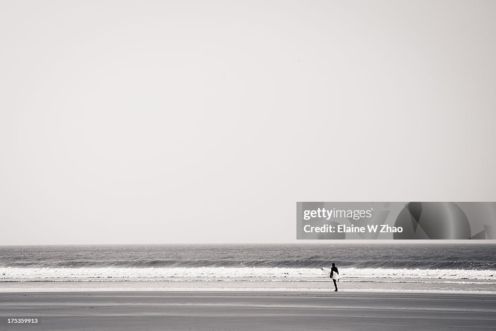 Surfer at Newgale Beach, Wales