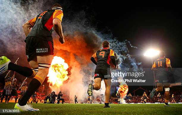 The Chiefs run out on the field for the Super Rugby Final match between the Chiefs and the Brumbies at Waikato Stadium on ugust 3, 2013 in Hamilton,...