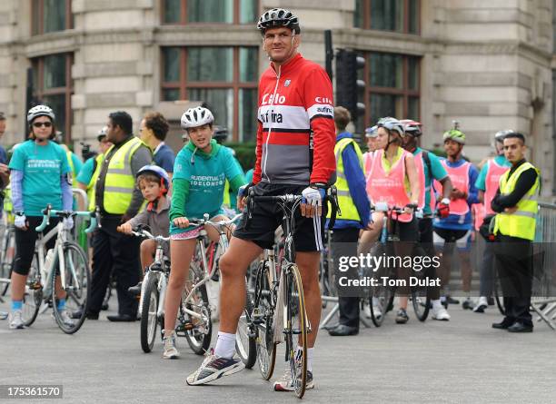 Cyclists led by former rugby player Martin Johnson attempt to break the Guinness World Record for the longest single line of bikes during the...