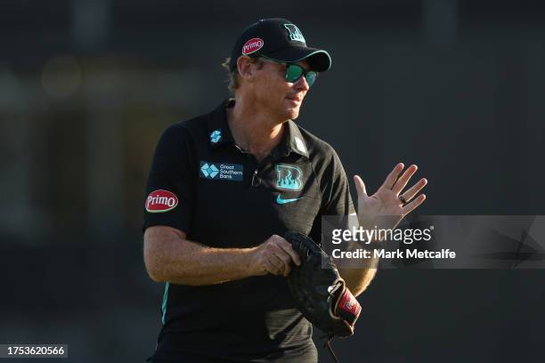 Heat head coach Ashley Noffke looks on during the WBBL match between Sydney Sixers and Brisbane Heat at North Sydney Oval, on October 24 in Sydney,...