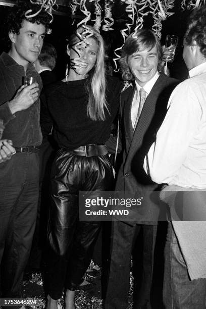 Olivier Chandon de Brailles, Christie Brinkley, and Christopher Atkins attend a party, celebrating the 16th birthday of Calvin Klein's daughter, at...