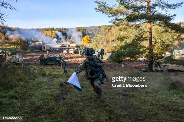 Soldier during a staged fight and evacuation of injured soldiers at a Combined Resolve multinational training exercise, with participating forces...
