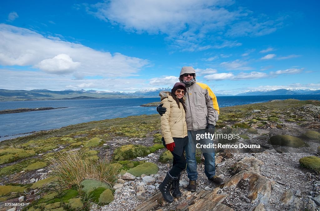 Couple on cold island near Ushuaia