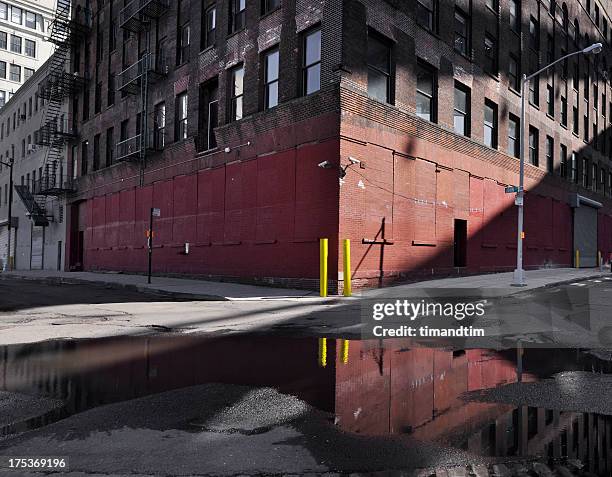 empty street corner - puddle reflection stock pictures, royalty-free photos & images