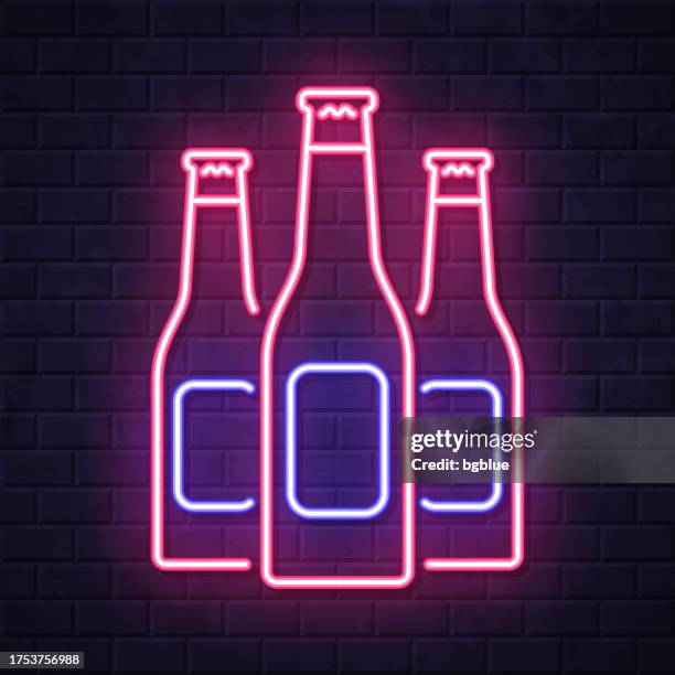 beer bottles. glowing neon icon on brick wall background - cider stock illustrations