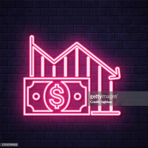stockillustraties, clipart, cartoons en iconen met declining graph with dollar banknote. glowing neon icon on brick wall background - rente