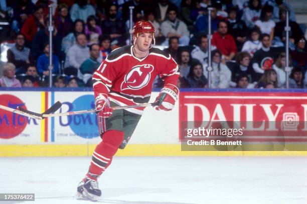 Brendan Shanahan of the New Jersey Devils skates on the ice during an NHL game against the New York Islanders circa 1990 at the Nassau Coliseum in...