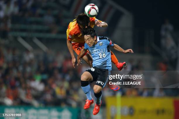 Ko Matsubara of Shimizu S-Pulse and Koji Miyoshi of Kawasaki Frontale compete for the ball during the J.League J1 first stage match between Shimizu...