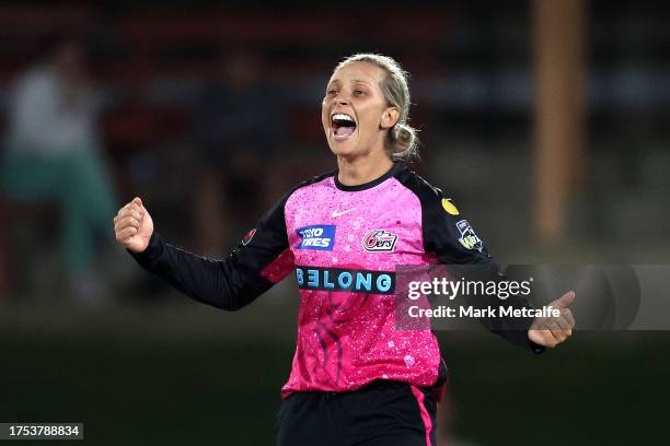 Ash Gardner of the Sixers celebrates taking the wicket of Georgia Redmayne of the Heat during the WBBL match between Sydney Sixers and Brisbane Heat...