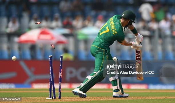 Reeza Hendricks of South Africa is bowled by Shoriful Islam of Bangladesh during the ICC Men's Cricket World Cup India 2023 between South Africa and...