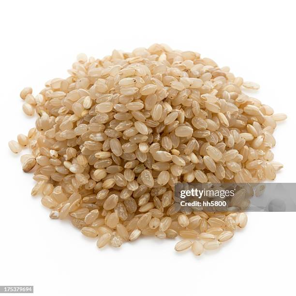 brown rice - naturreis stock-fotos und bilder