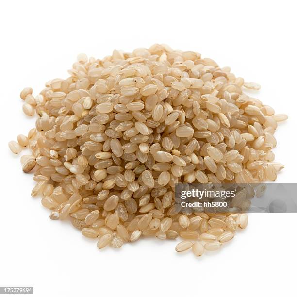 brown rice - brown rice stock pictures, royalty-free photos & images