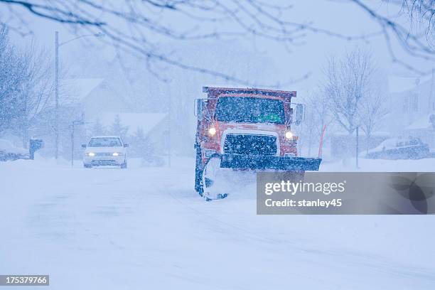 heavy snowfall and a car behind the snowplow - snowplow 個照片及圖片檔