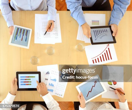 Using Tablet Computers At Meeting High-Res Stock Photo - Getty Images