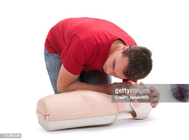 first aid - man checking breathing cpr - respiratory tract stock pictures, royalty-free photos & images