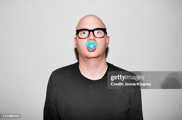 acting like a baby - schnuller stock-fotos und bilder