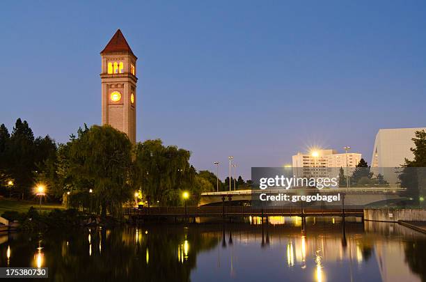 clock tower during nighttime at riverfront park in spokane, wa - spokane stock pictures, royalty-free photos & images
