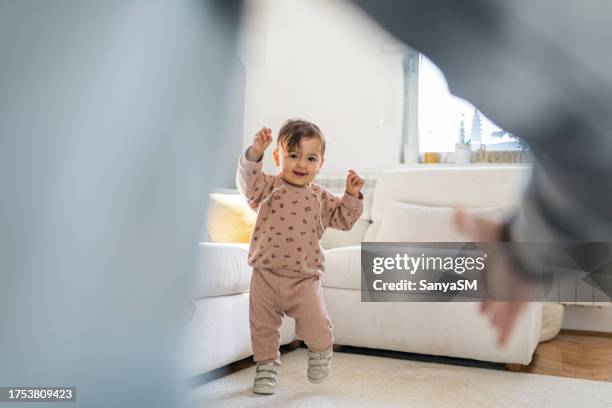 first steps of my baby - first steps stock pictures, royalty-free photos & images