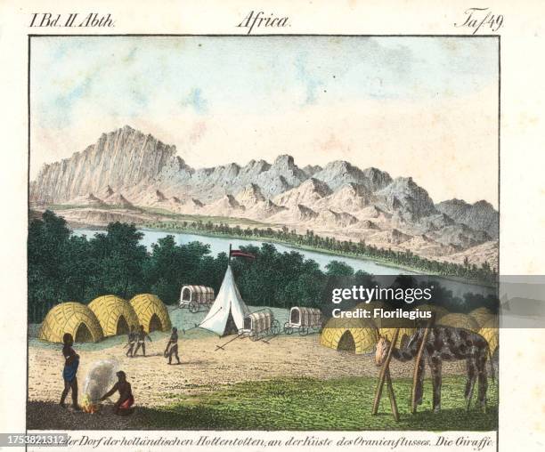 Khoikhoi kraal with huts and wagons and a tethered giraffe on the banks of the Orange River, South Africa. Handcoloured lithograph from Friedrich...