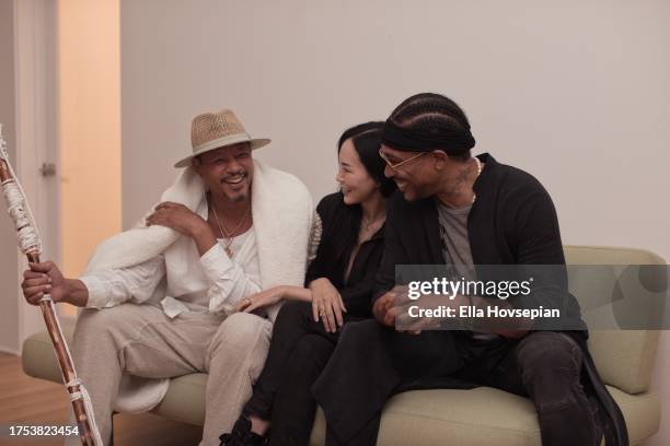 Terrance Howard, Mira Pak and Tony DeNiro pose at Joey Tierney's Book Launch Party "23 Letters With Love" at Private Residence on October 23, 2023 in...