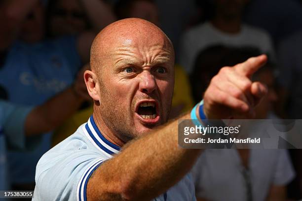 Coventry City fan shows his anger during the Sky Bet League One match between Crawley Town FC and Coventry at Broadfield Stadium on August 03, 2013...