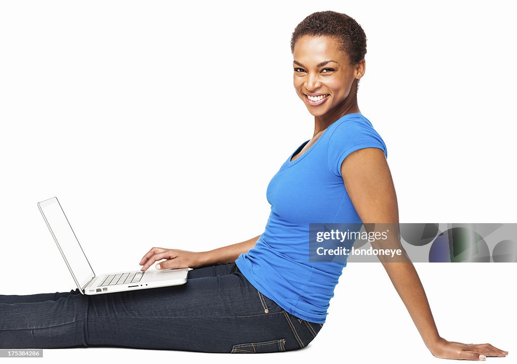 African American Woman Using Laptop On The Floor - Isolated