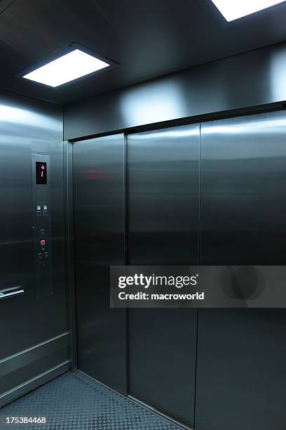 inside an elevator - elevator doors stock pictures, royalty-free photos & images