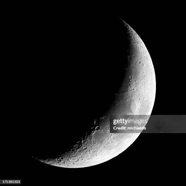 crescent new moon (photo) - moon surface stock pictures, royalty-free photos & images