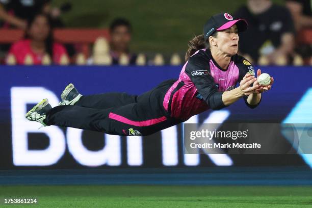 Erin Burns of the Sixers attempts a catch during the WBBL match between Sydney Sixers and Brisbane Heat at North Sydney Oval, on October 24 in...