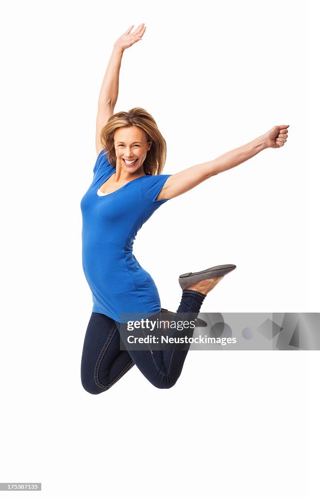 Ecstatic Mid Adult Woman Jumping - Isolated