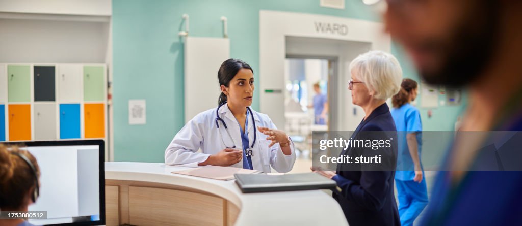 Female doctor with administrator