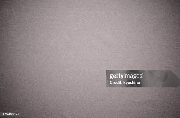 sfondo texture tessuto grigio con spotlight - sfondo grigio foto e immagini stock