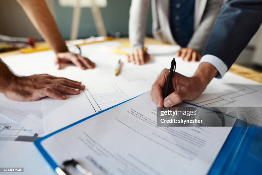 Building Signing Contract Signing A Contract High-Res Stock Photo - Getty Images