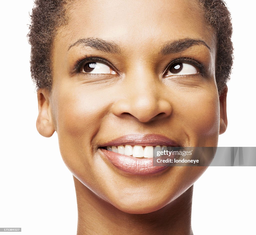 African American Woman Smiling While Looking Up - Isolated