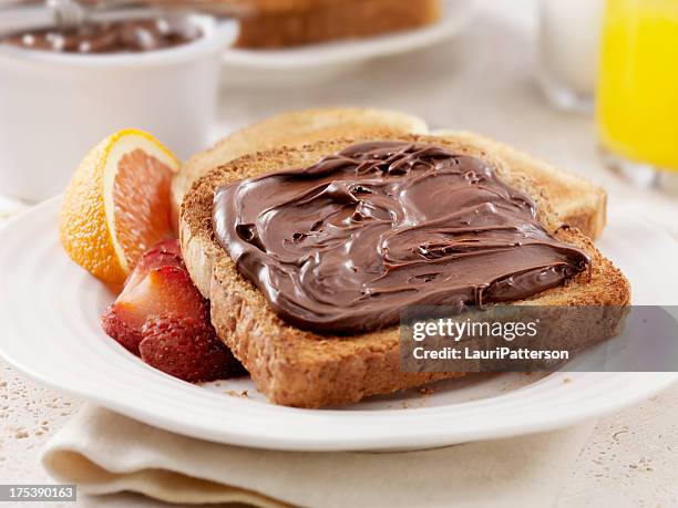 chocolate hazelnut spread - nutella stock pictures, royalty-free photos & images