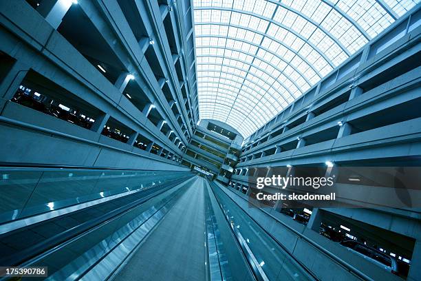 airport escalator - columbus ohio stock pictures, royalty-free photos & images