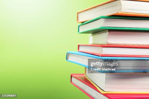 stack of colorful books - textbook stack stock pictures, royalty-free photos & images