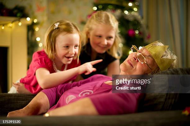 christmas at grans - grandma sleeping stock pictures, royalty-free photos & images