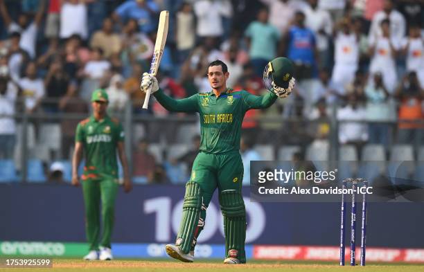 Quinton de Kock of South Africa celebrates their century during the ICC Men's Cricket World Cup India 2023 between South Africa and Bangladesh at...