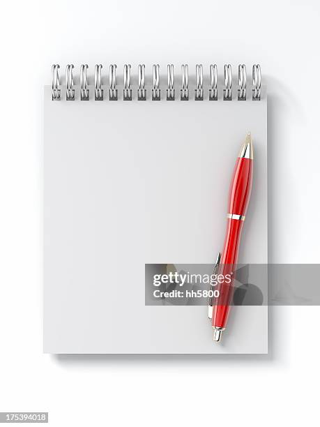 notepad with pen - spiraalblok stockfoto's en -beelden